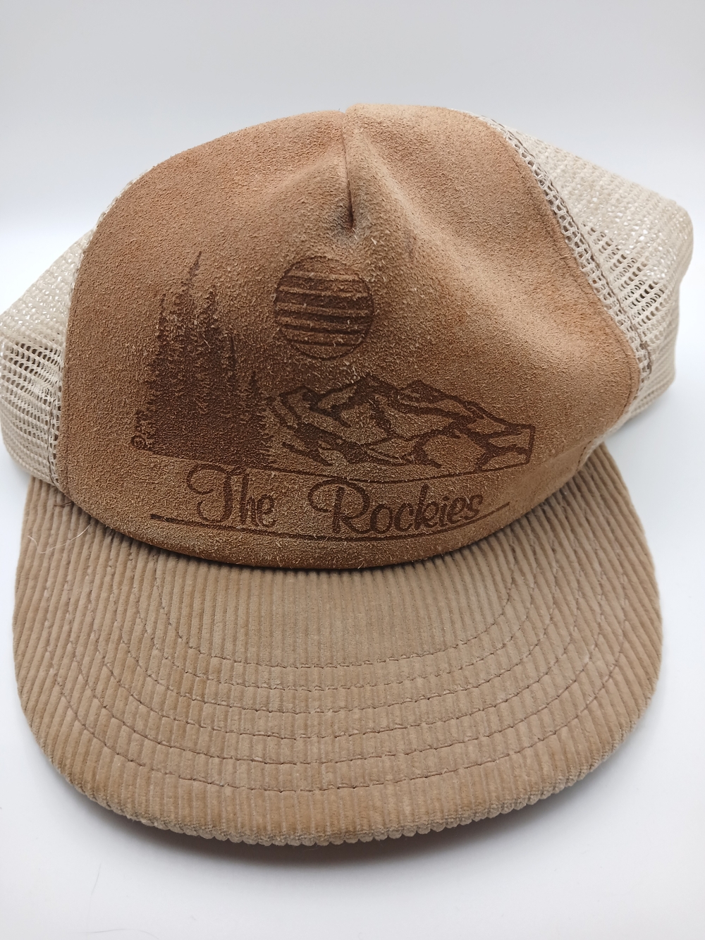 Vintage “The Rockies” trucker hat featuring a genuine leather front panel